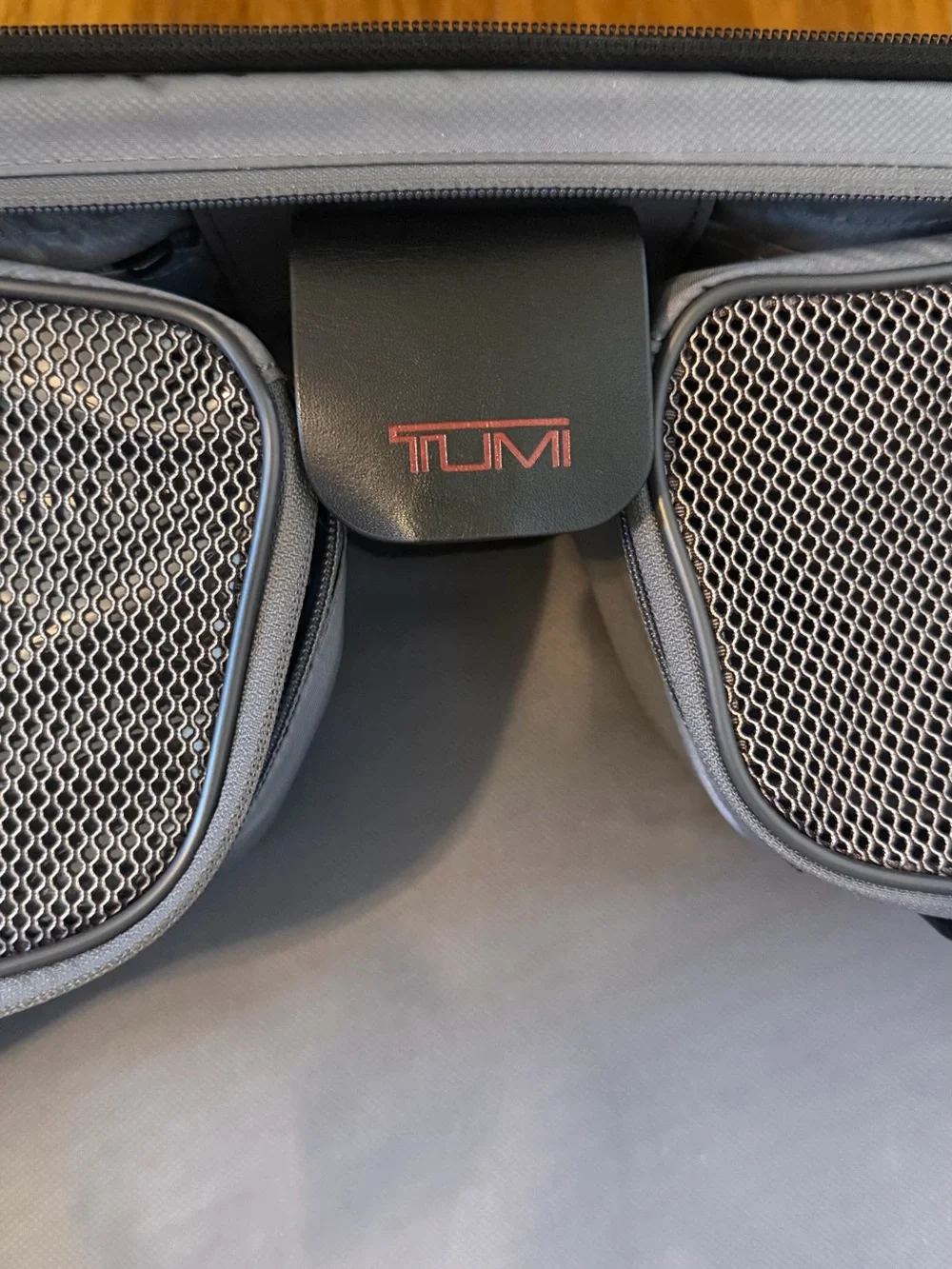 Tumi Black Garment Spinnerwith Front Organization Pockets